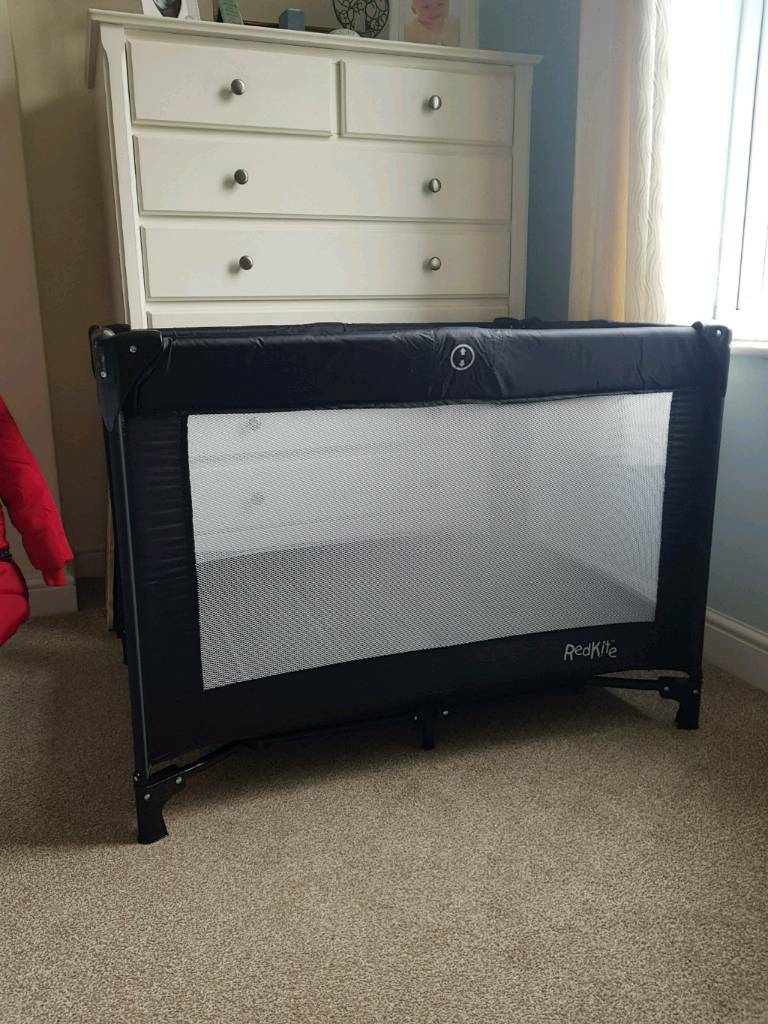 red kite travel cot size